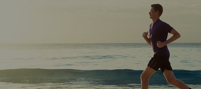 Man running on beach