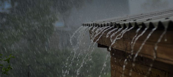 Rain falling off roof