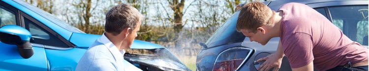 two drivers arguing after traffic accident