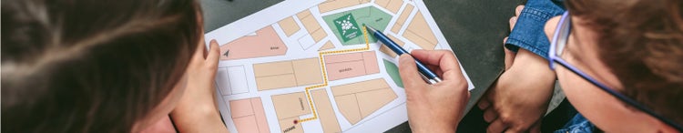 mother explaining to her children the emergency assembly point