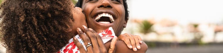 mum hugging daughter