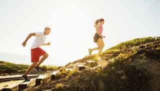 Couple running outdoors