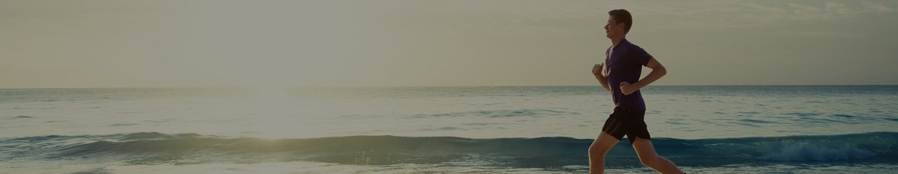 Man jogging on the beach