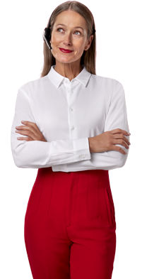 Smiling woman with arms crossed looking up