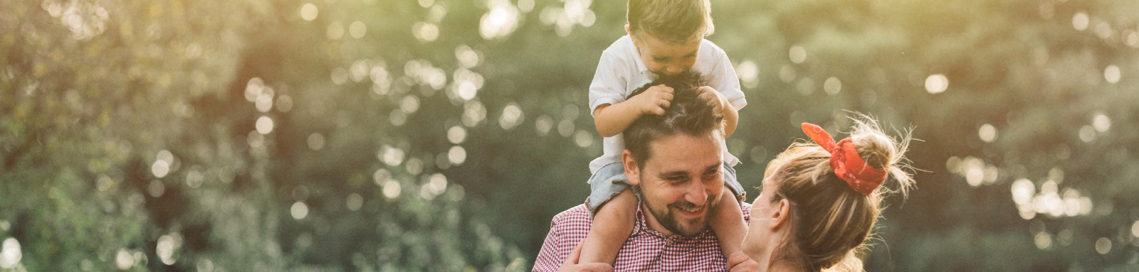 Boy on dad's shoulders