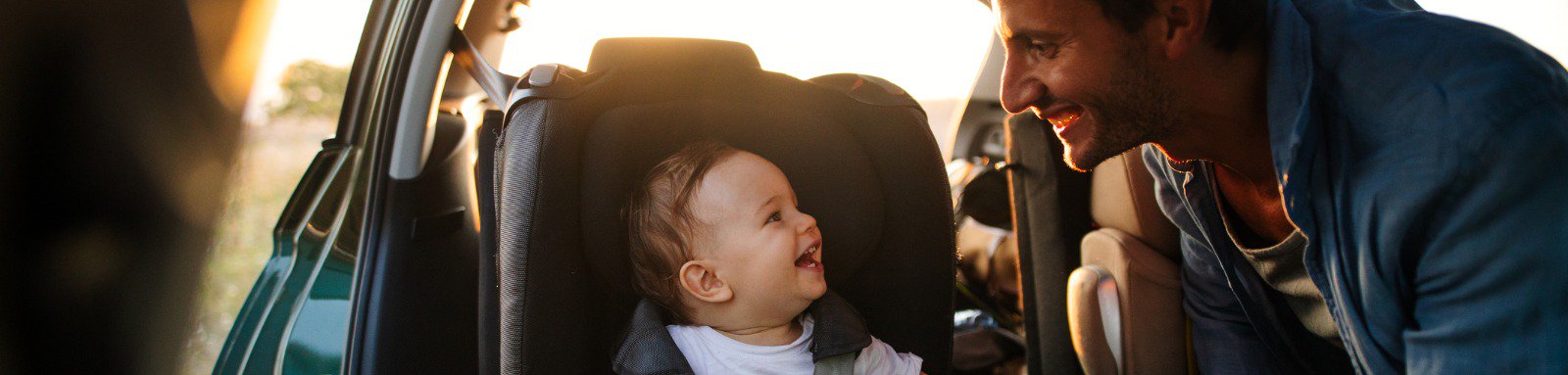 Dad with son in car