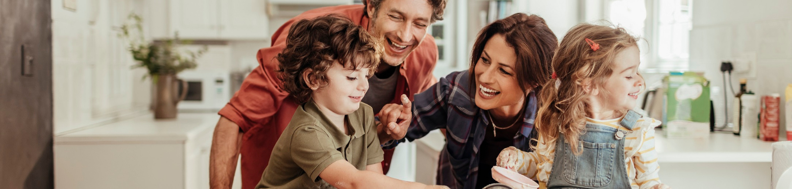 Family cooking together in the park