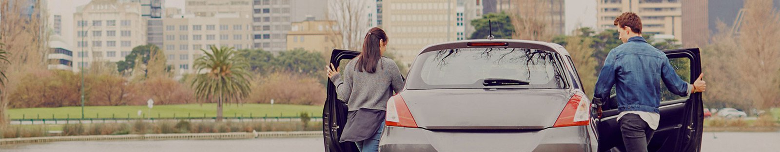 Couple getting into a car