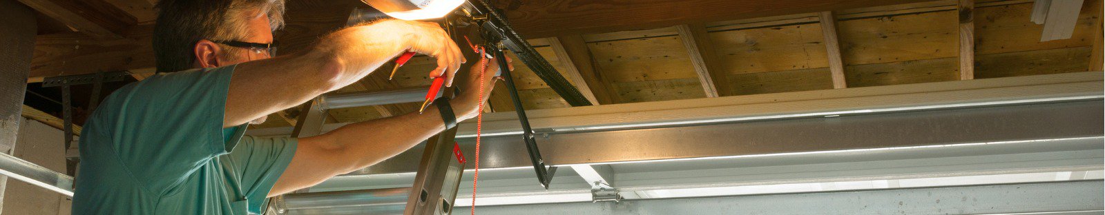 Technician working on repairs in garage