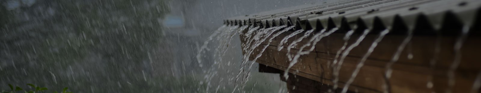 Rain water flowing from a rooftop