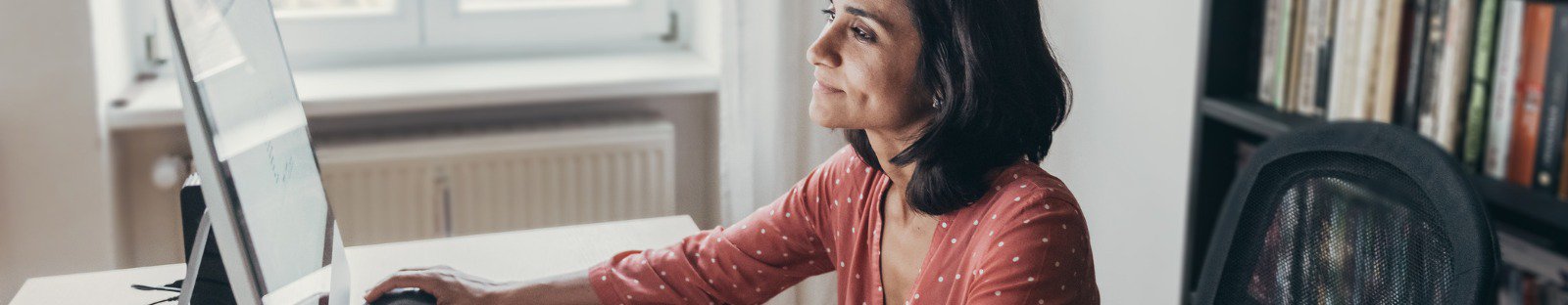 woman working at computer at home