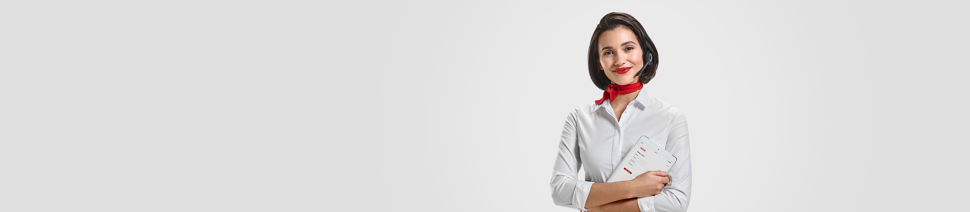 AAMI girl with arms crossed holding a tablet