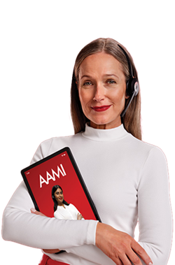Woman with dark blonde hair wearing a headset and cradling an iPad showing an AAMI screen