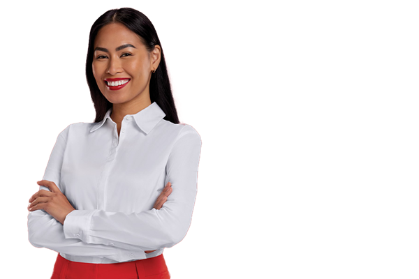 Smiling professional woman with long black hair and wearing a white collared shirt has her arms crossed