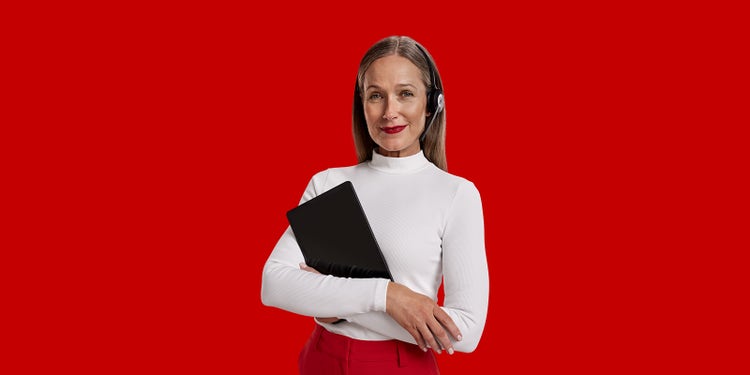 AAMI Woman holding ipad and wearing headphones