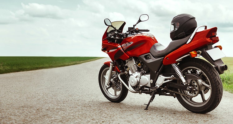 Red motorcycle on road